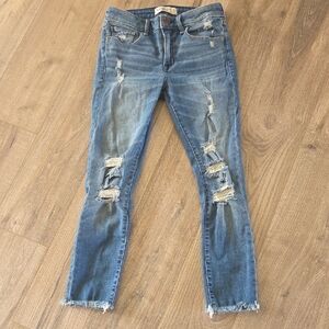 Distressed Blue Jeans